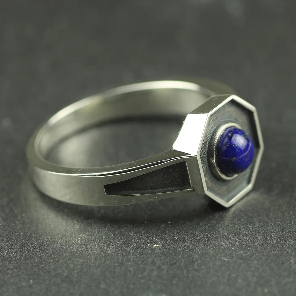 Silver ring with a blue gemstone inspired by Damon Salvatore from The Vampire Diaries.