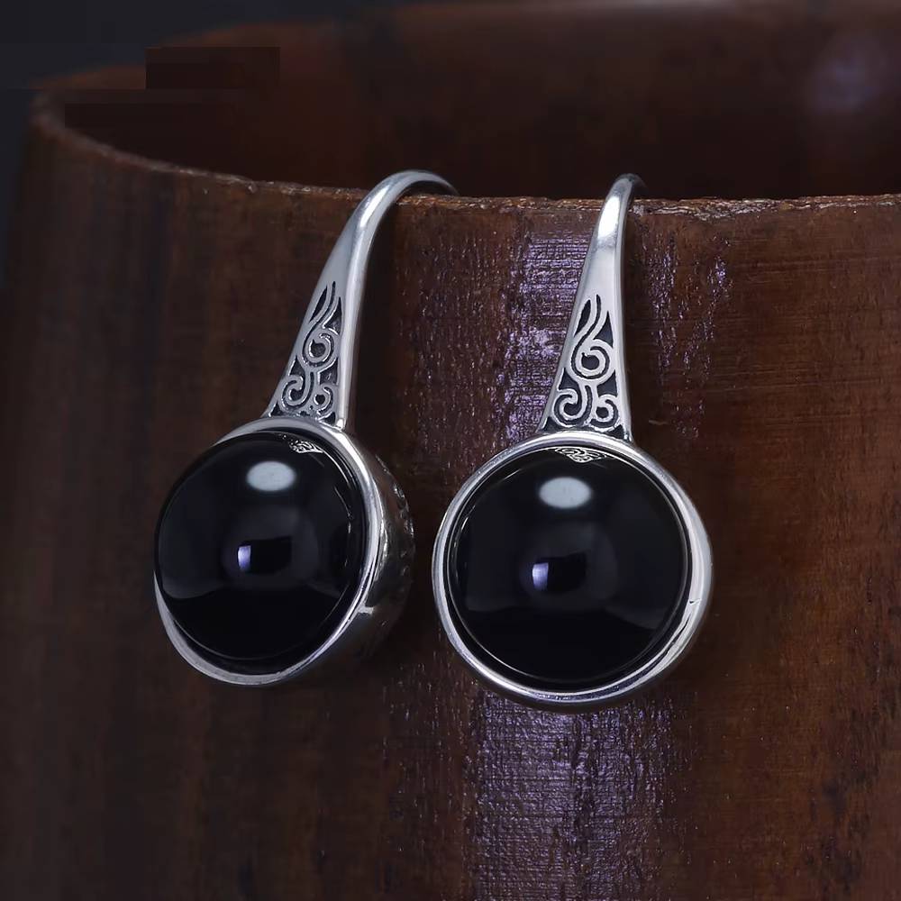 Sterling silver onyx drop earrings with engraved design