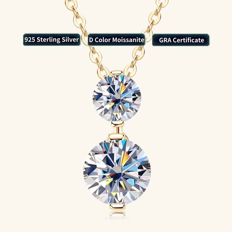 Gold-plated double moissanite drop necklace featuring 7mm and 5mm round-cut D-color stones in prong settings, on an adjustable 925 silver chain.