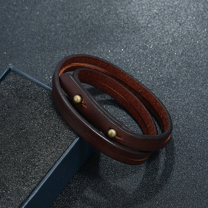 Brown leather double-wrap bracelet with brass button stud – vintage unisex style