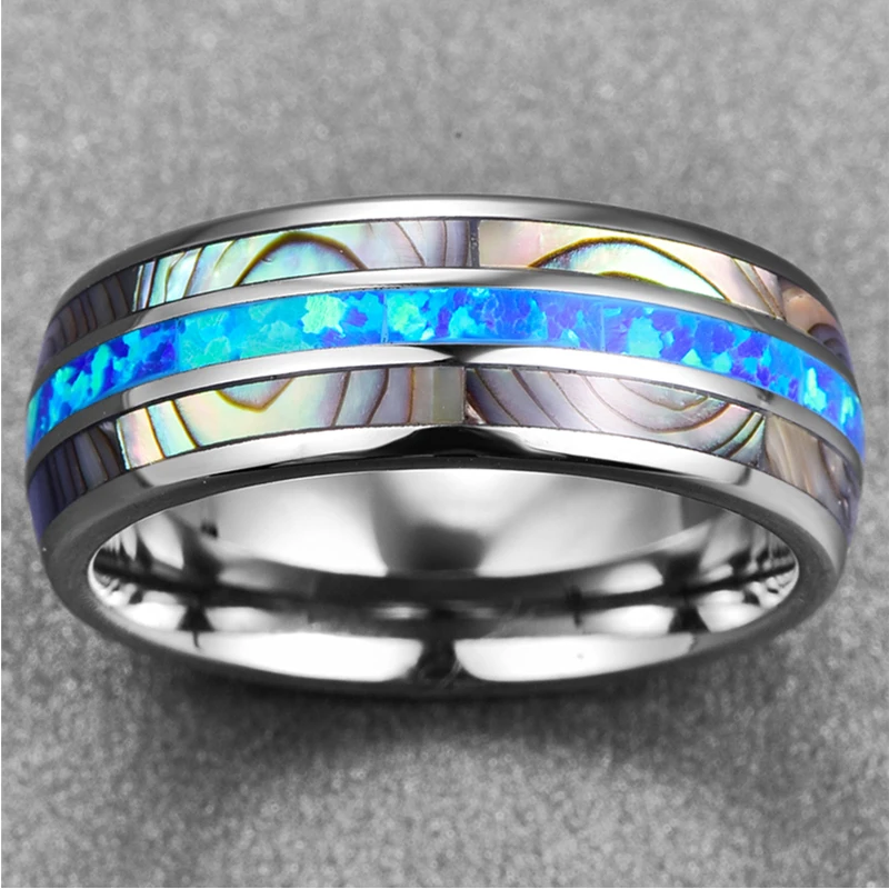 Blue Fire Opal and Shell Tungsten Carbide Rings