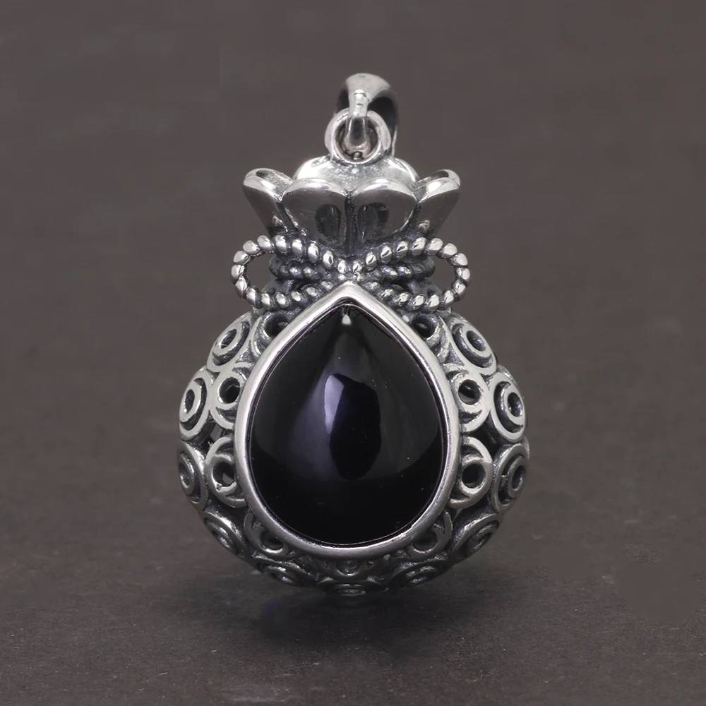 Vintage 925 sterling silver money bag pendant with black agate gemstone drop, hollow-carved design and raised Chinese character – necklace on dark background