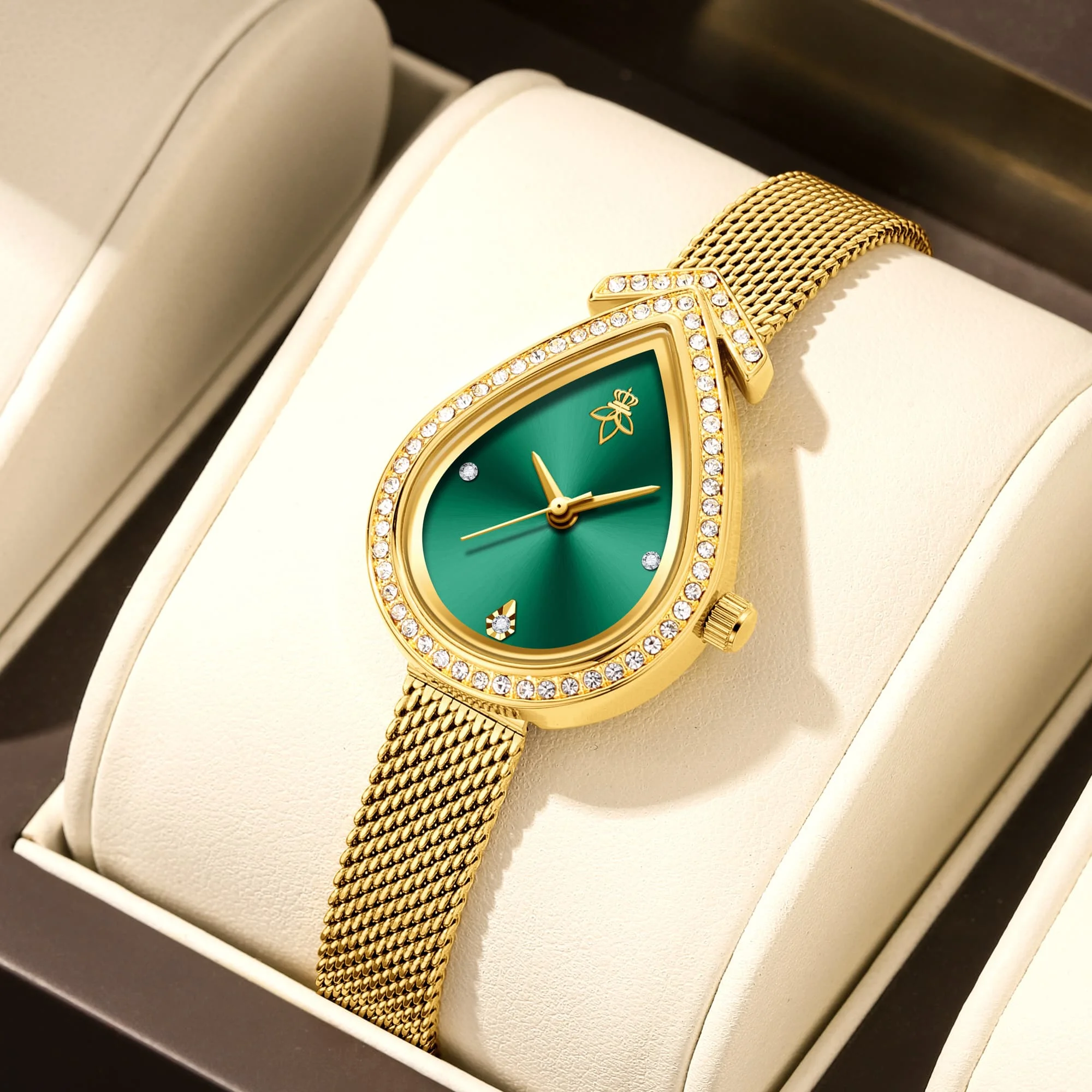 Teardrop-shaped rhinestone gold watch with green dial