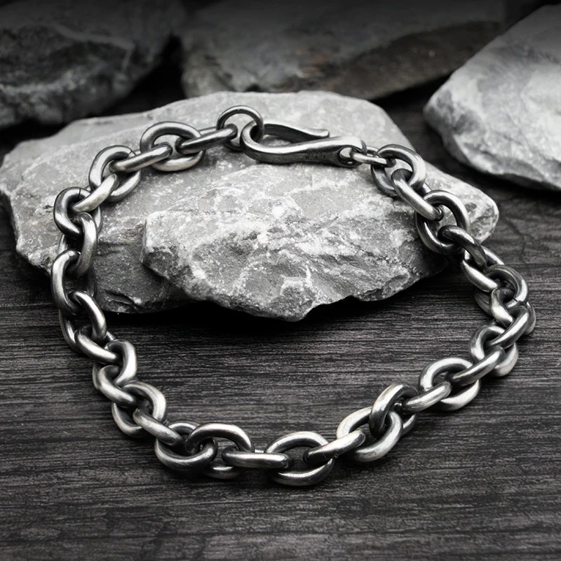 925 Sterling Silver Chain Bracelet for Men and Women on Stone Background