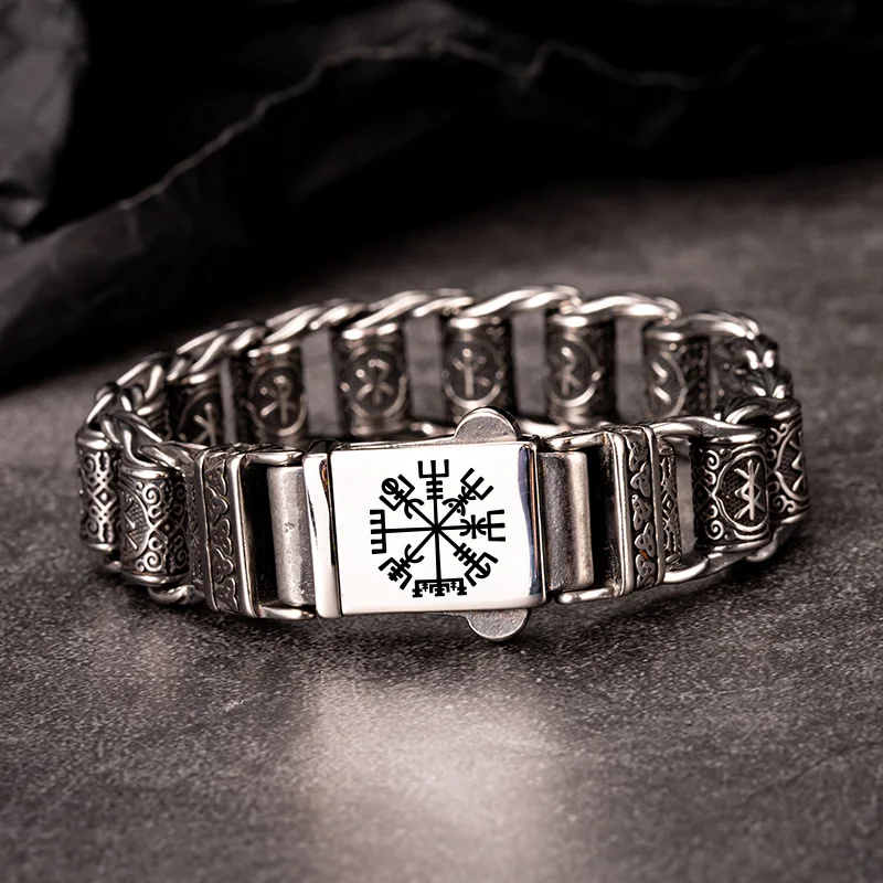 Close-up of Viking bracelet with Valknut rune clasp and Nordic patterned links