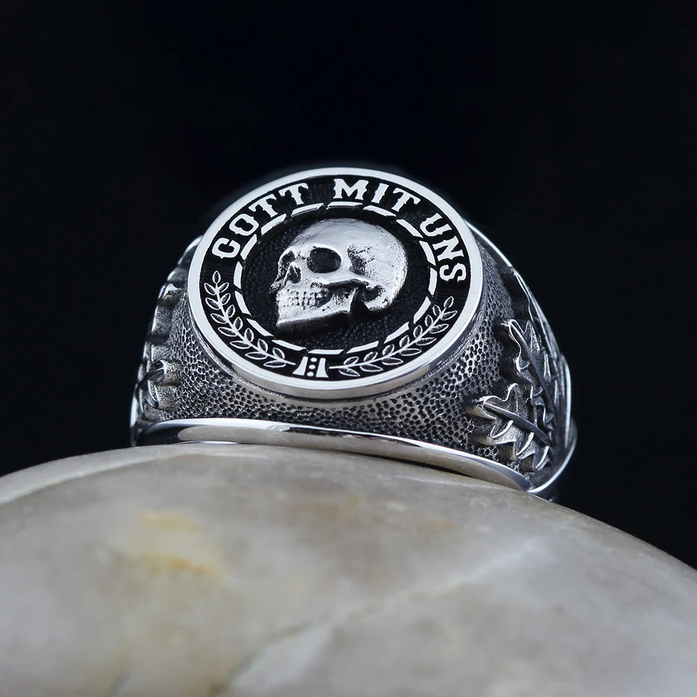 Sterling silver men’s signet ring with skull engraving and “GOTT MIT UNS” motto surrounded by oak leaves on textured sides