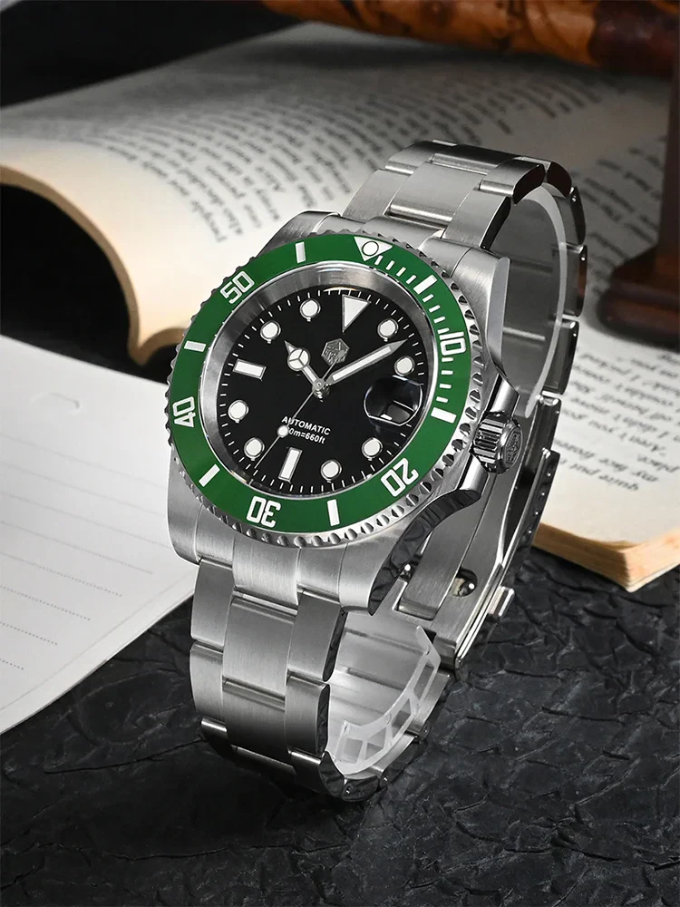 Stainless steel luxury dive watch featuring a black dial, luminous markers, and rotating green bezel.