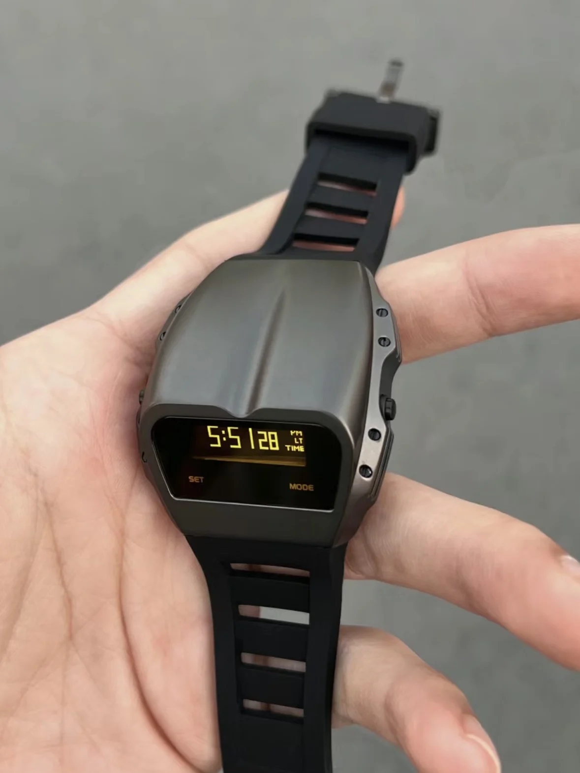 BENLYDESIGN Gladiator X7000 OLED digital watch with raise-to-wake display, rugged exoskeleton, and silicone strap.