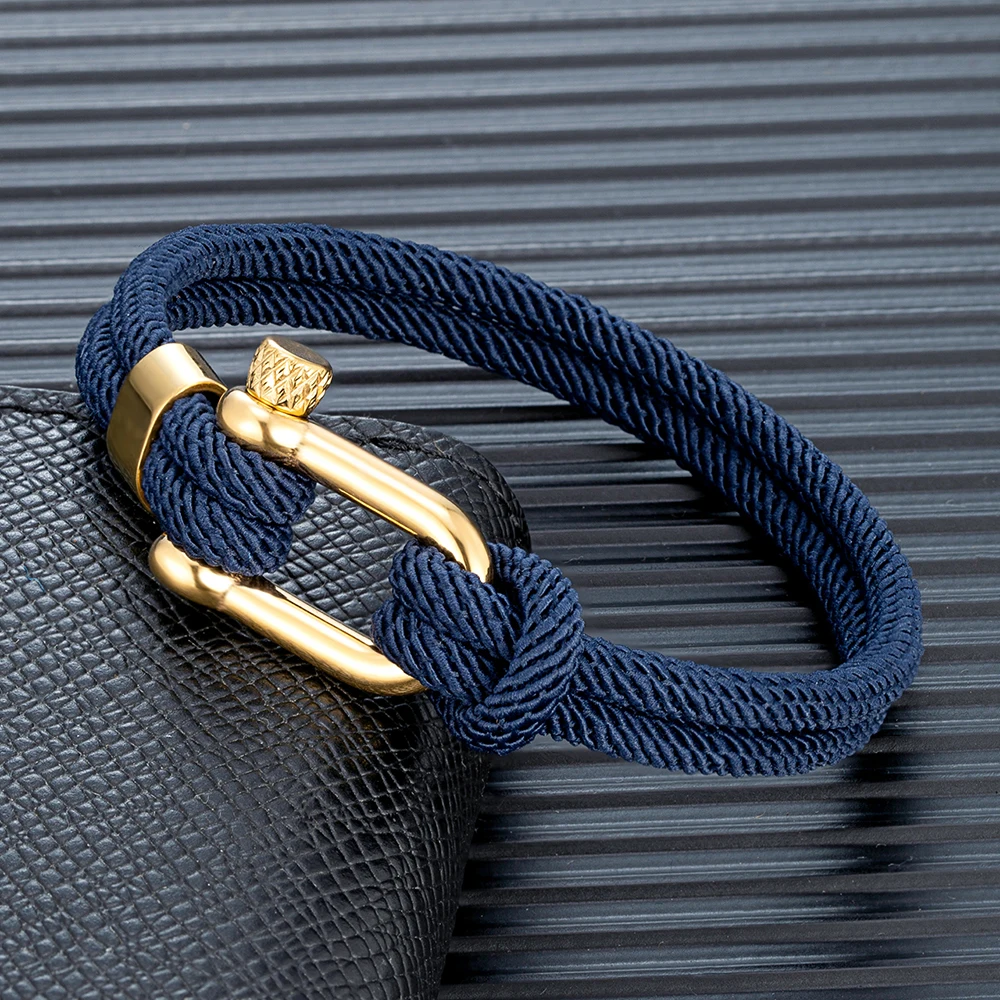Nautical rope bracelet gold stainless steel shackle in navy blue
