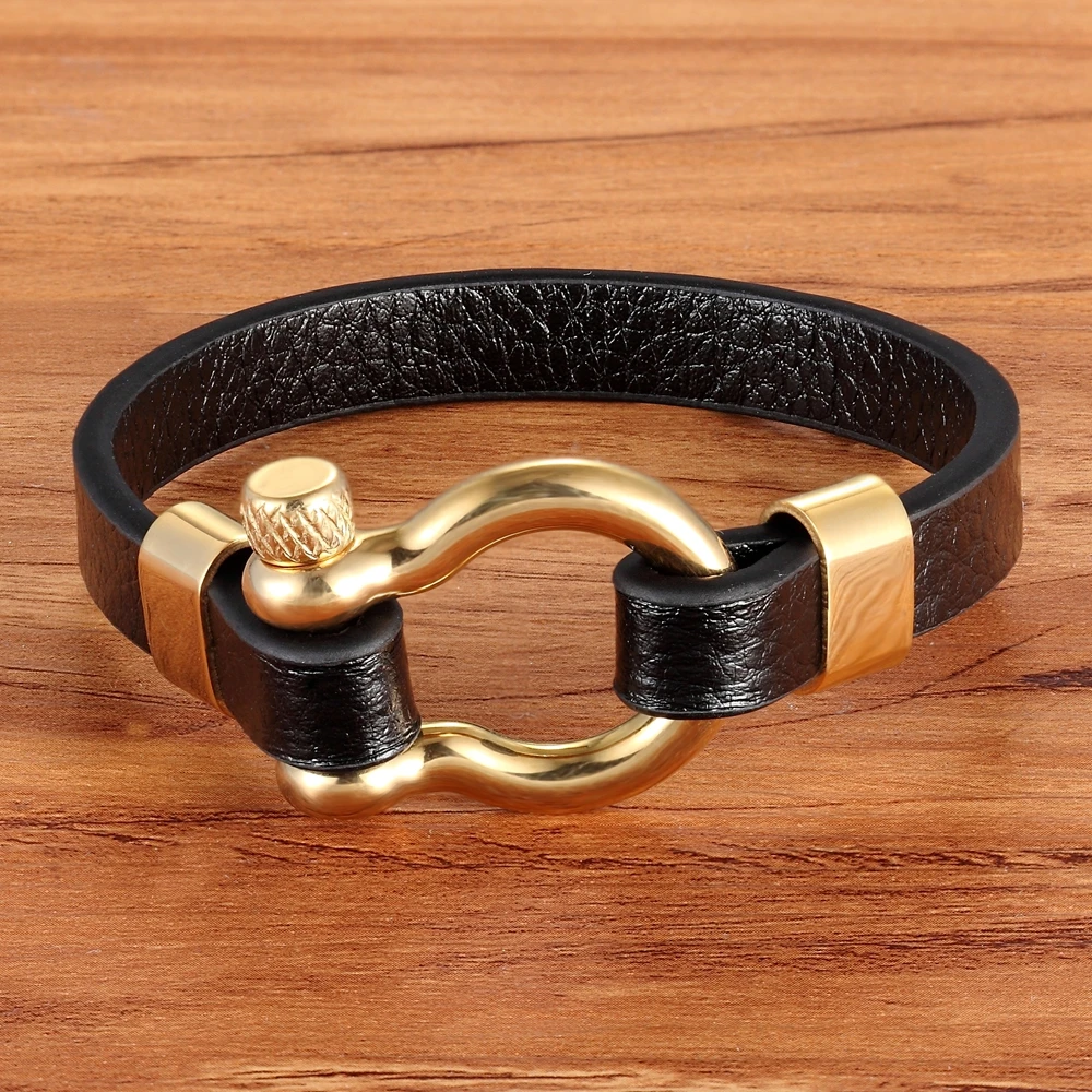 Black leather bracelet with gold round toggle clasp