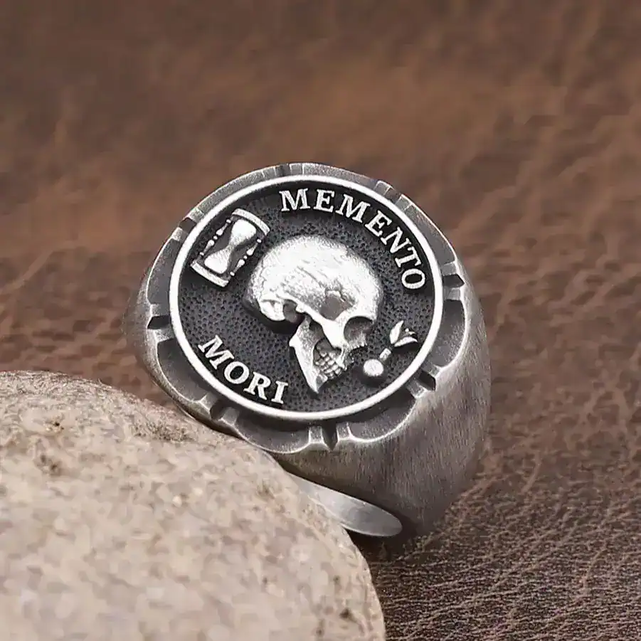 Detailed skull and memorial design ring for men and women.