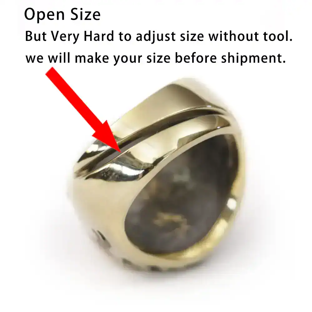 Close-up of a silver ring with black inlay and bold design, emphasizing durability and style.