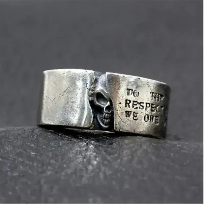 Sterling Silver Skull Ring with Engraved Text.