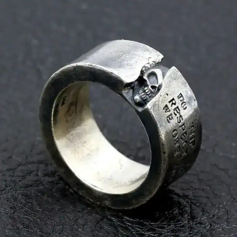 Sterling Silver Skull Ring with Lettering Detail.