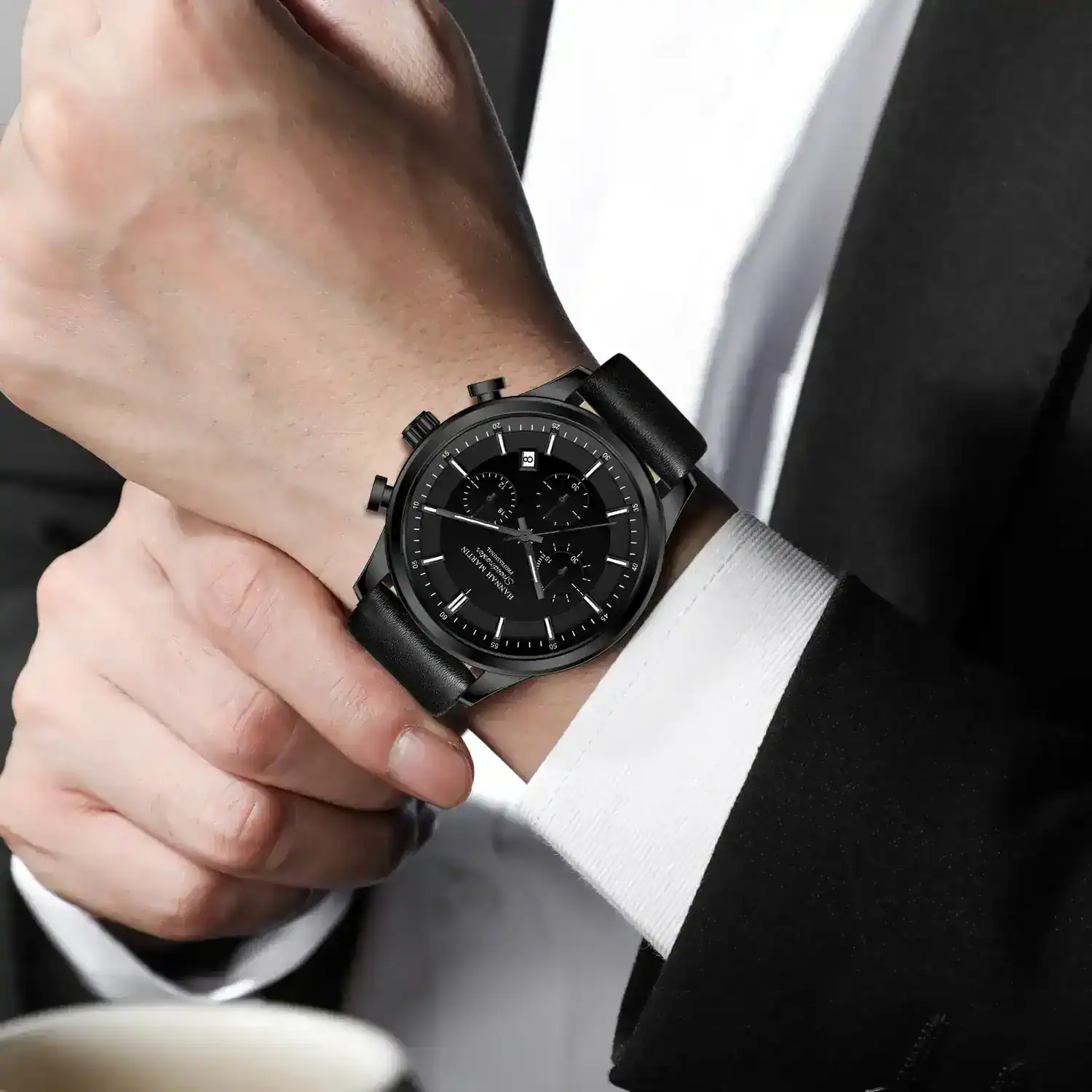 Stylish black leather strap men's watch with chronograph features and date display. Perfect for formal and casual wear.