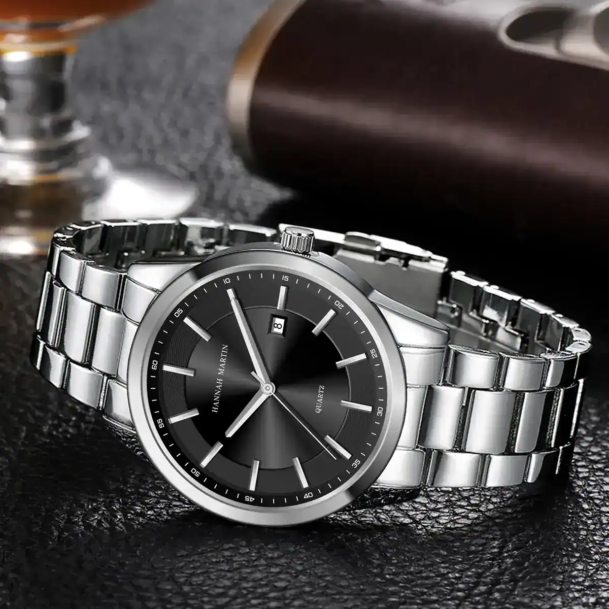 Stylish men's stainless steel wristwatch featuring a sleek black dial and date window.