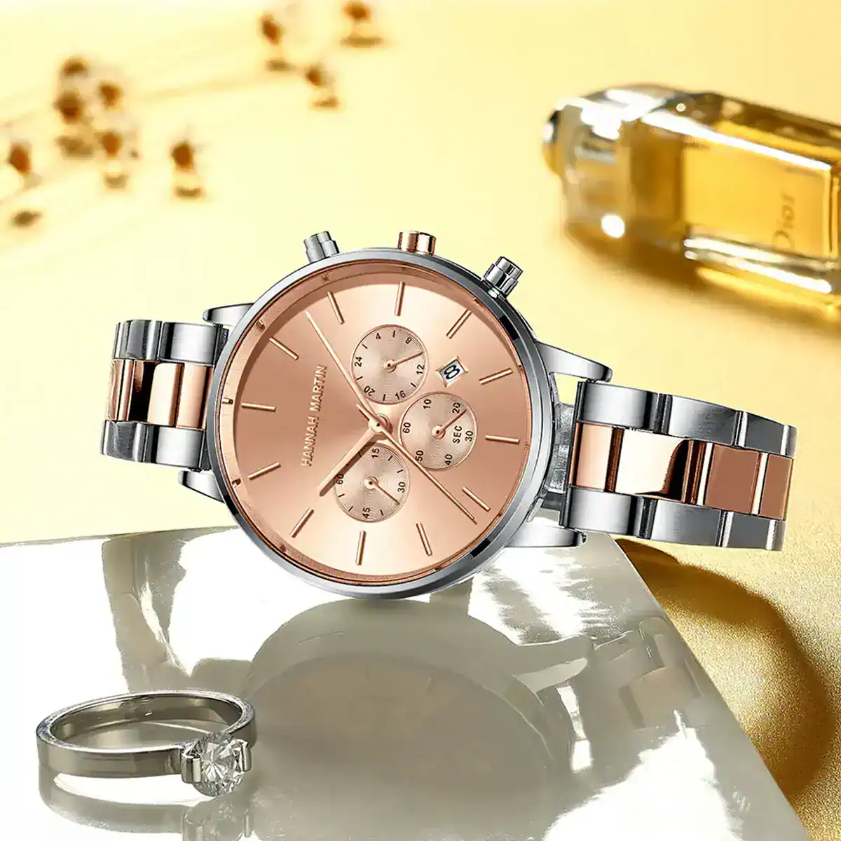 Stylish women's rose gold and silver bracelet watch featuring chronograph subdials and a date window.