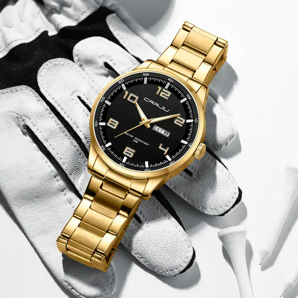 Luxurious gold-plated men's wristwatch with black dial and date display from Jewelry Addicts.