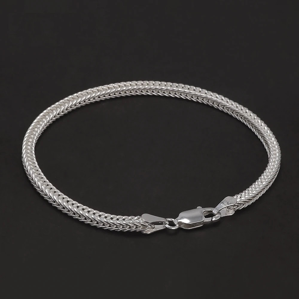 Elegant silver chain necklace with intricate woven design for women.