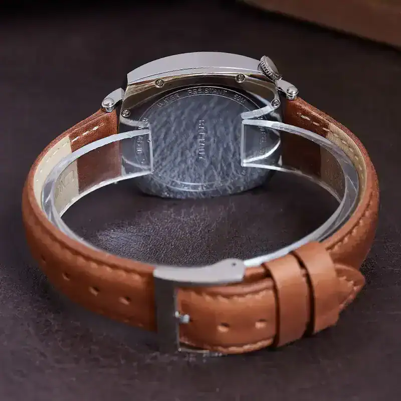 High-quality brown leather watch strap with stainless steel buckle, perfect for classic and casual styles.