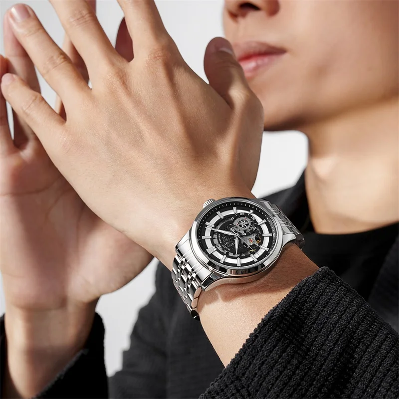 Elegant men's luxury watch with skeleton dial and stainless steel band.