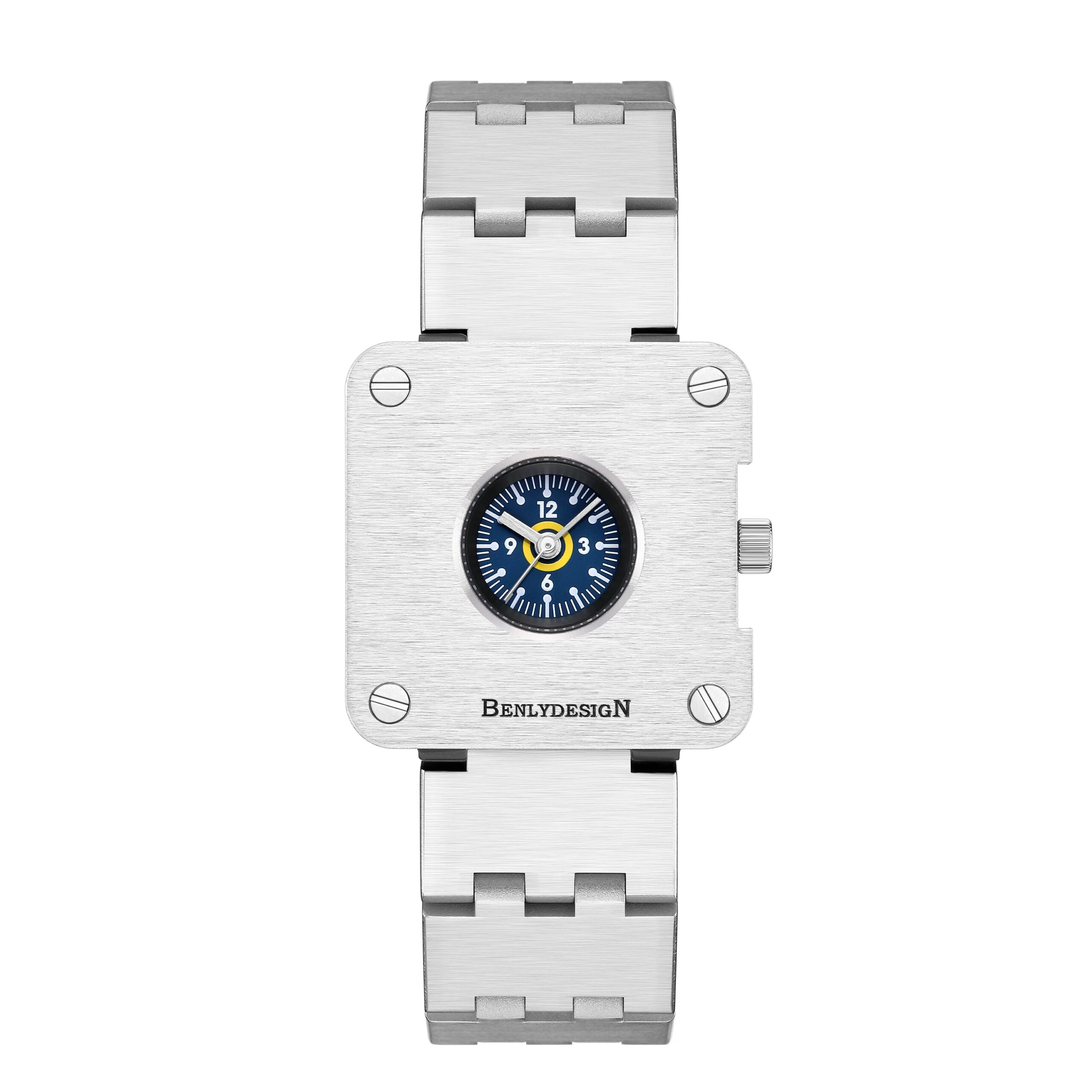 Silver wristwatch with a small round dial showcasing yellow, white, and blue accents for men’s style.