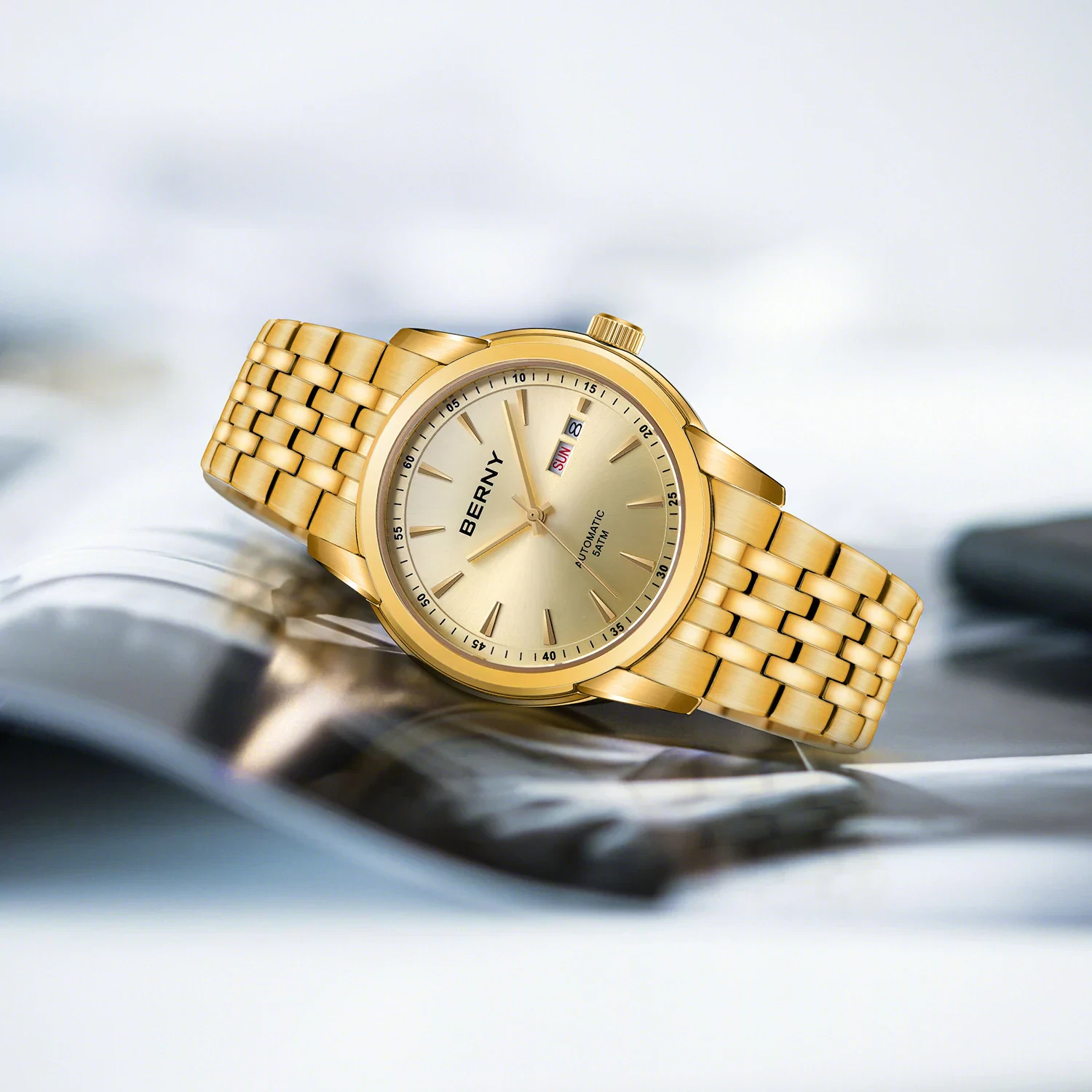 Stunning gold-tone watch with bracelet strap, precision timekeeping, and day-date display from Jewelry Addicts.