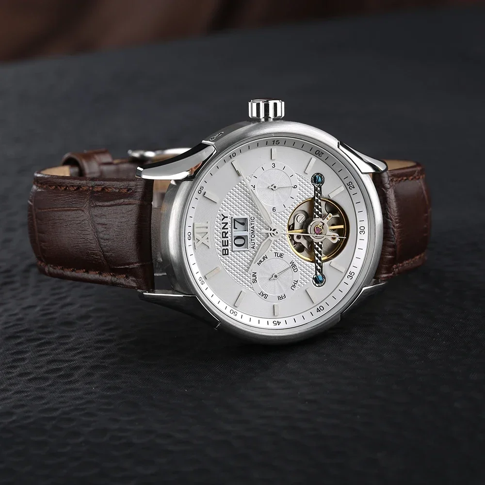 Premium men's wristwatch featuring a brown leather strap and intricate silver dial design.