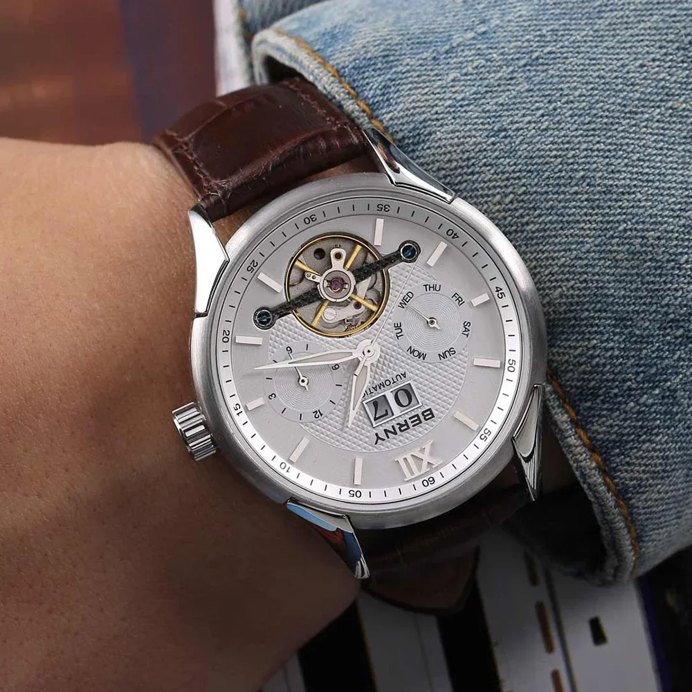 Elegant men's wristwatch with leather band, silver dial, and multi-function displays.