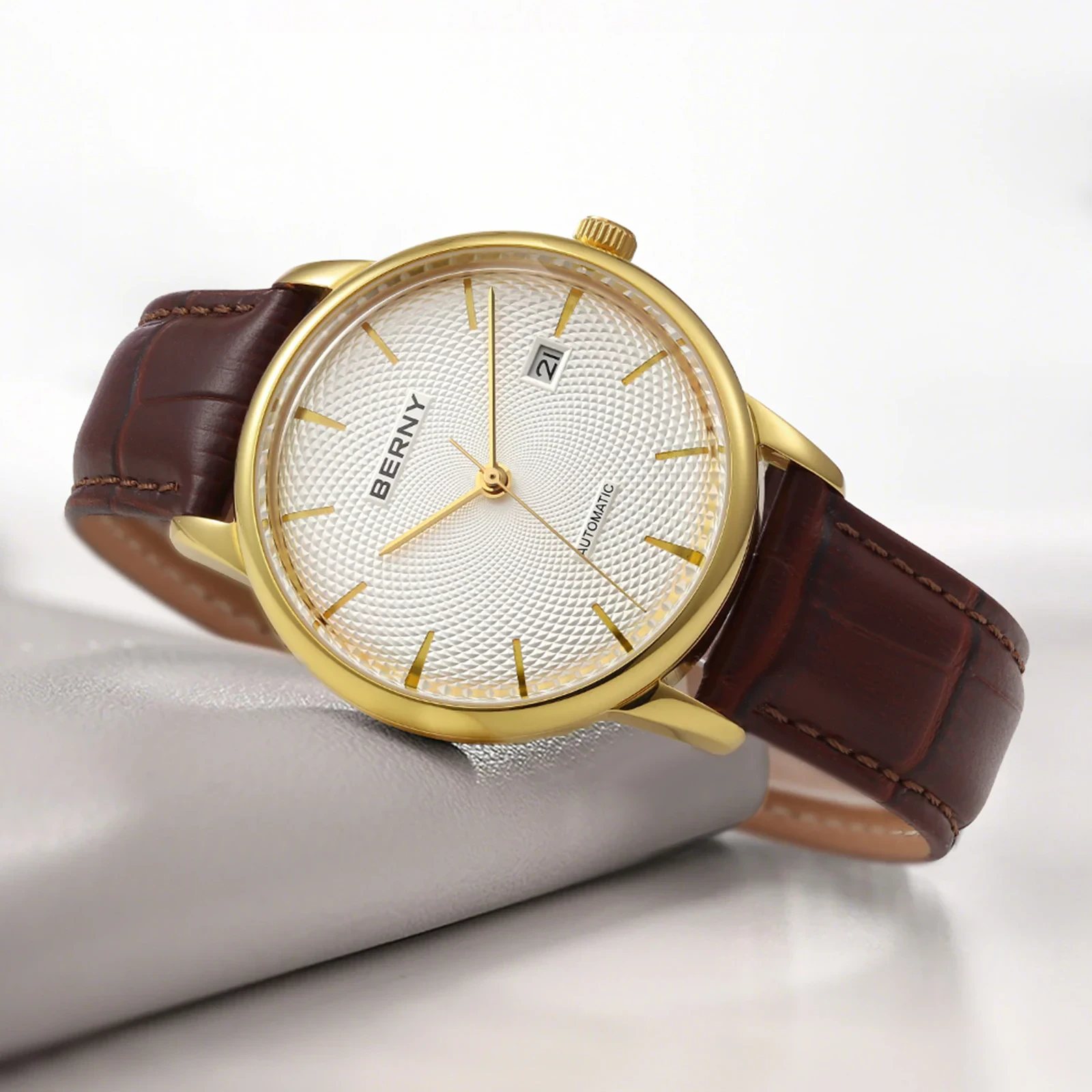 Luxury gold watch with leather strap, perfect for men's fashion and everyday wear.