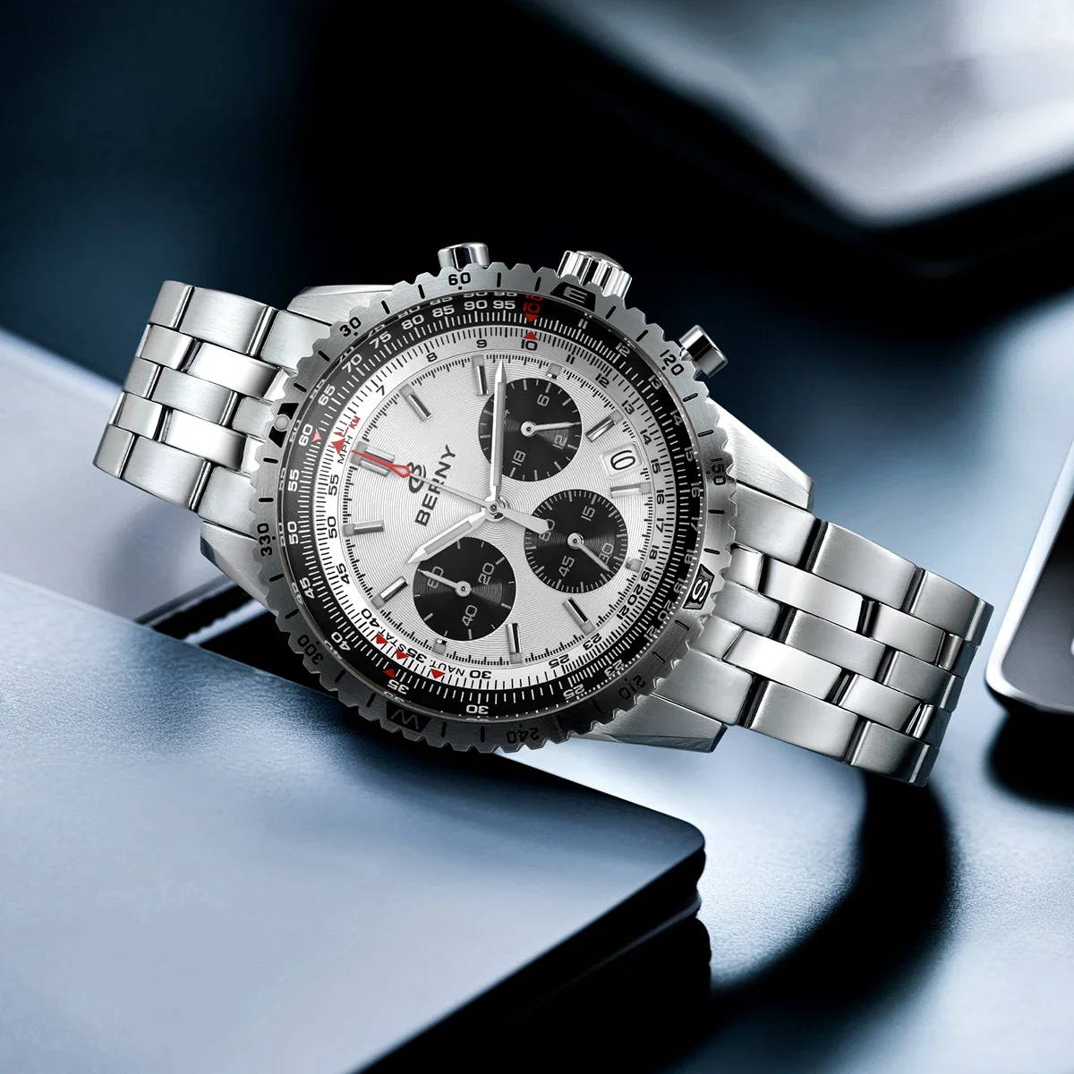 Stainless steel men's chronograph watch with silver dial and black subdials. Perfect for stylish accessories.