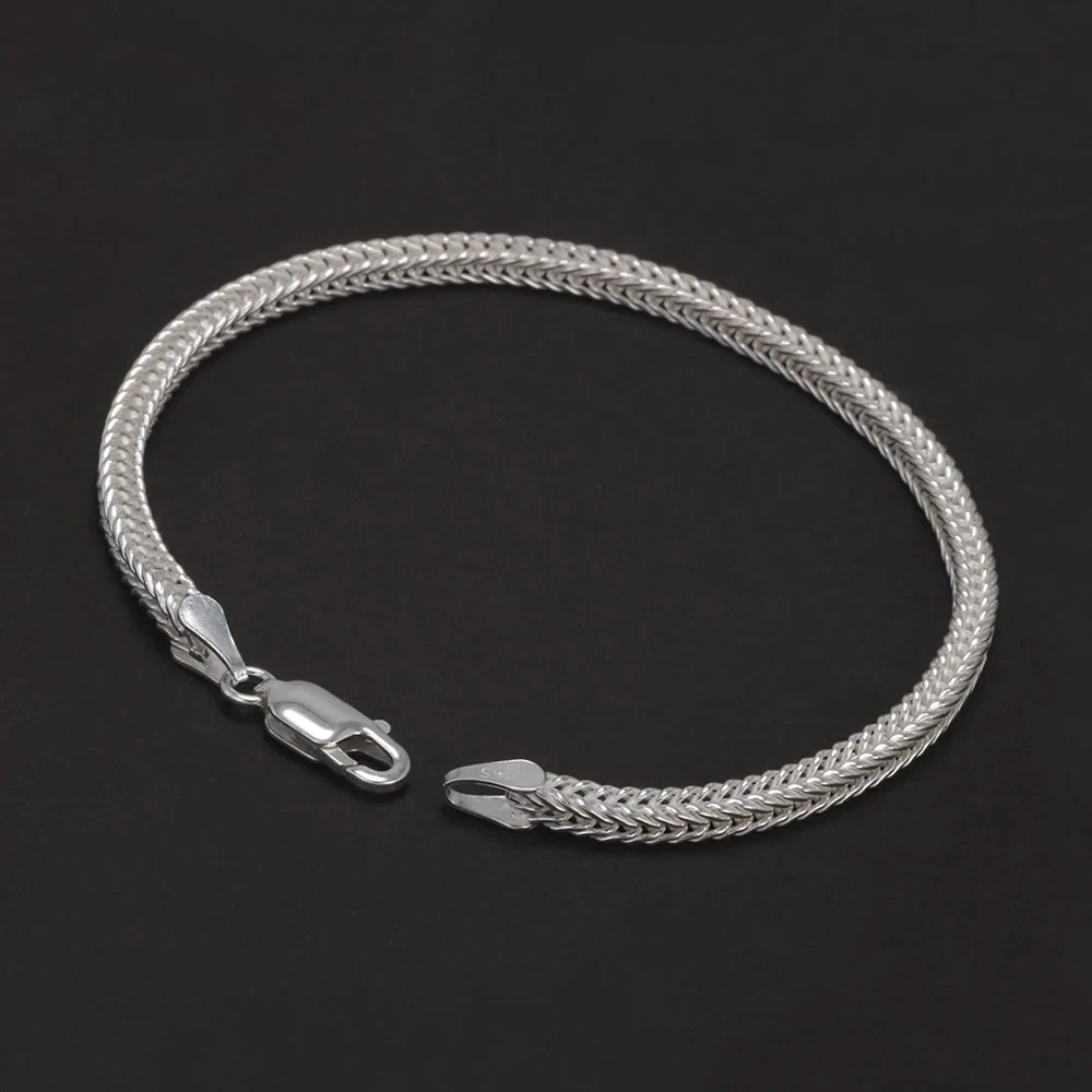 Elegant sterling silver rope chain necklace with a secure lobster clasp. Perfect jewelry accessory for men and women.