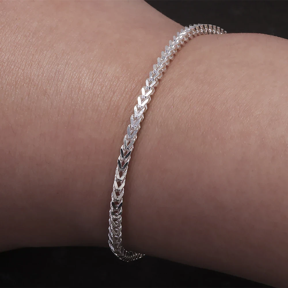 Elegant sterling silver herringbone chain bracelet for women, stylish and versatile.