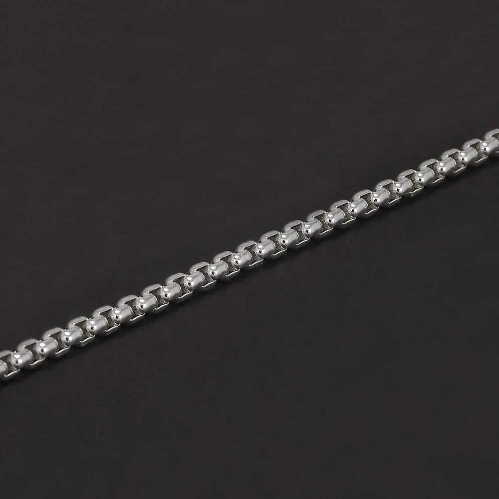High-quality sterling silver chain with sleek, polished finish. Perfect for everyday wear or layering.