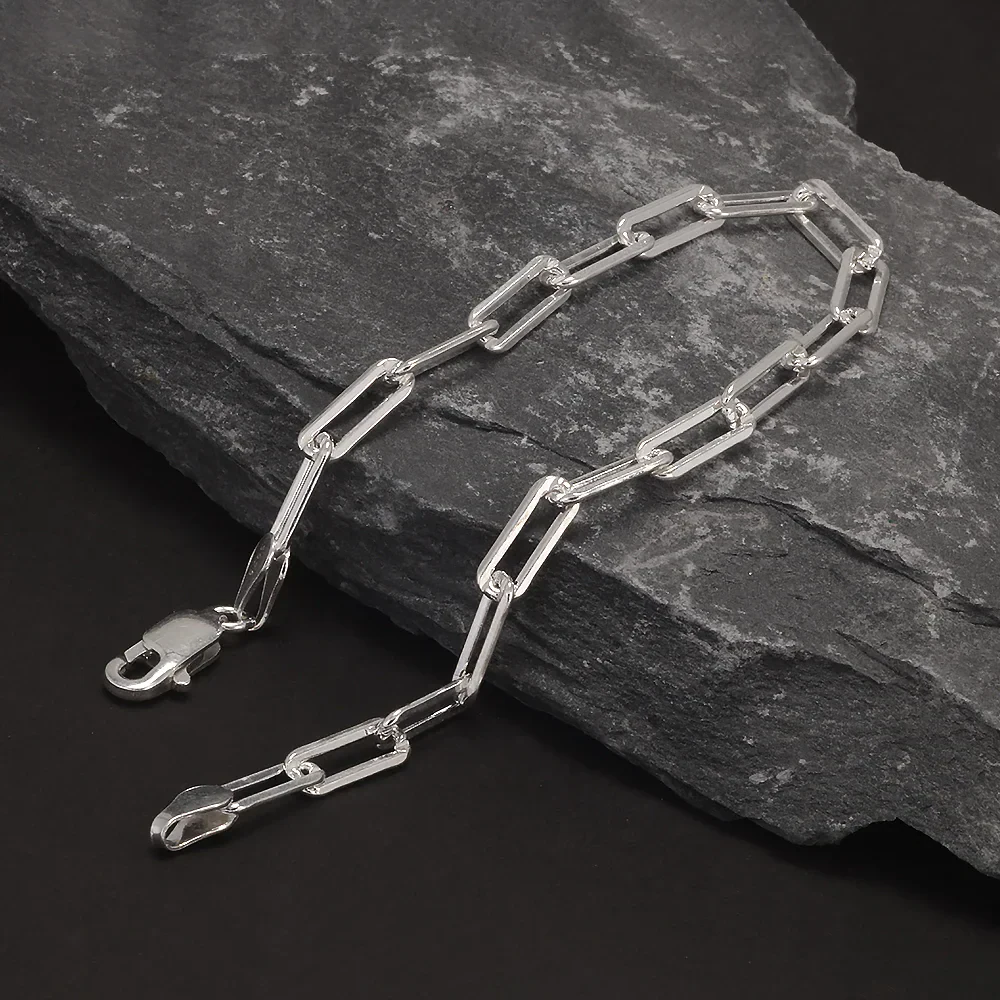 Stylish metallic silver link chain bracelet for men and women. Perfect for casual or formal wear. Unique jewelry gift idea.
