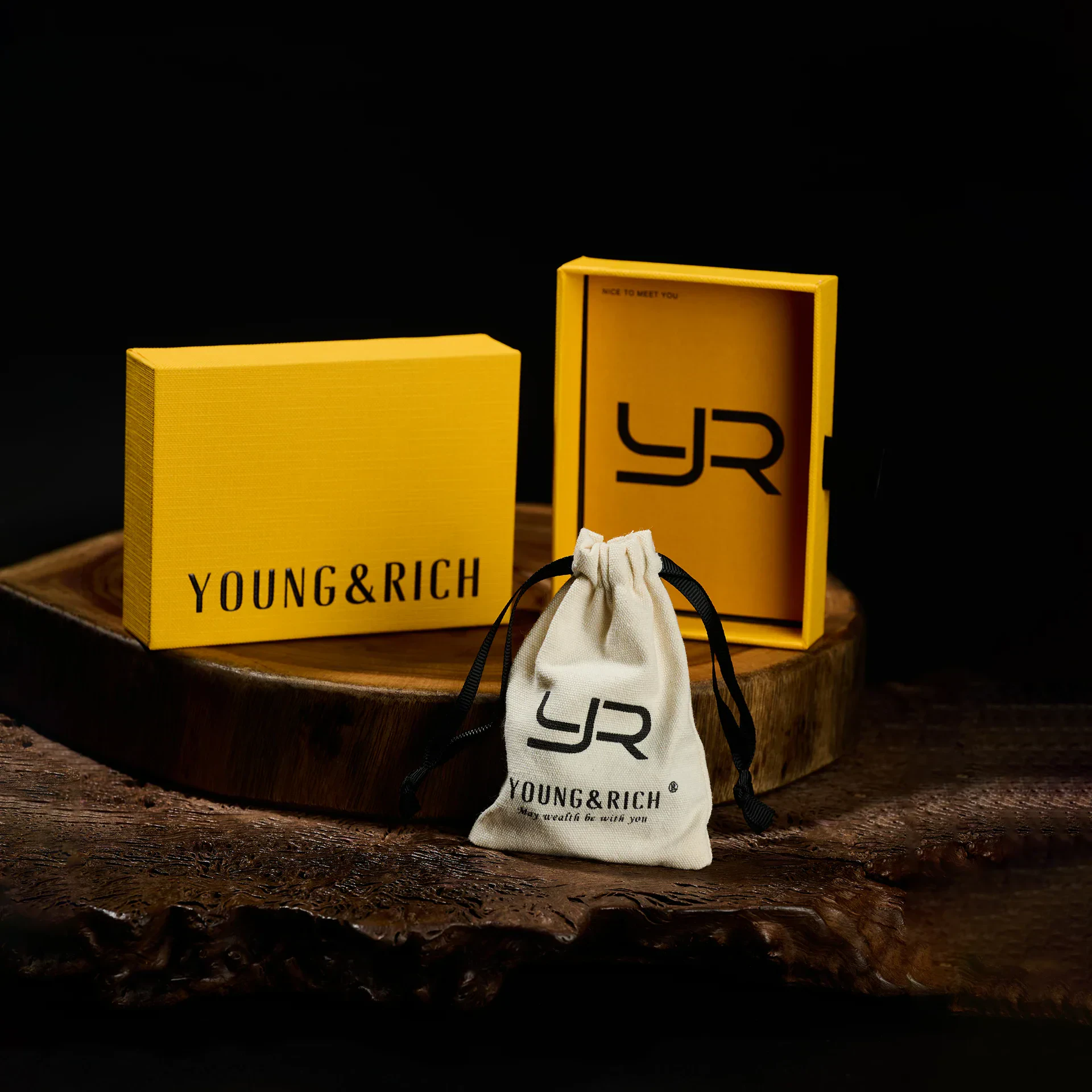 High-quality jewelry packaging featuring Y& R Young & Rich branding and a fabric pouch.