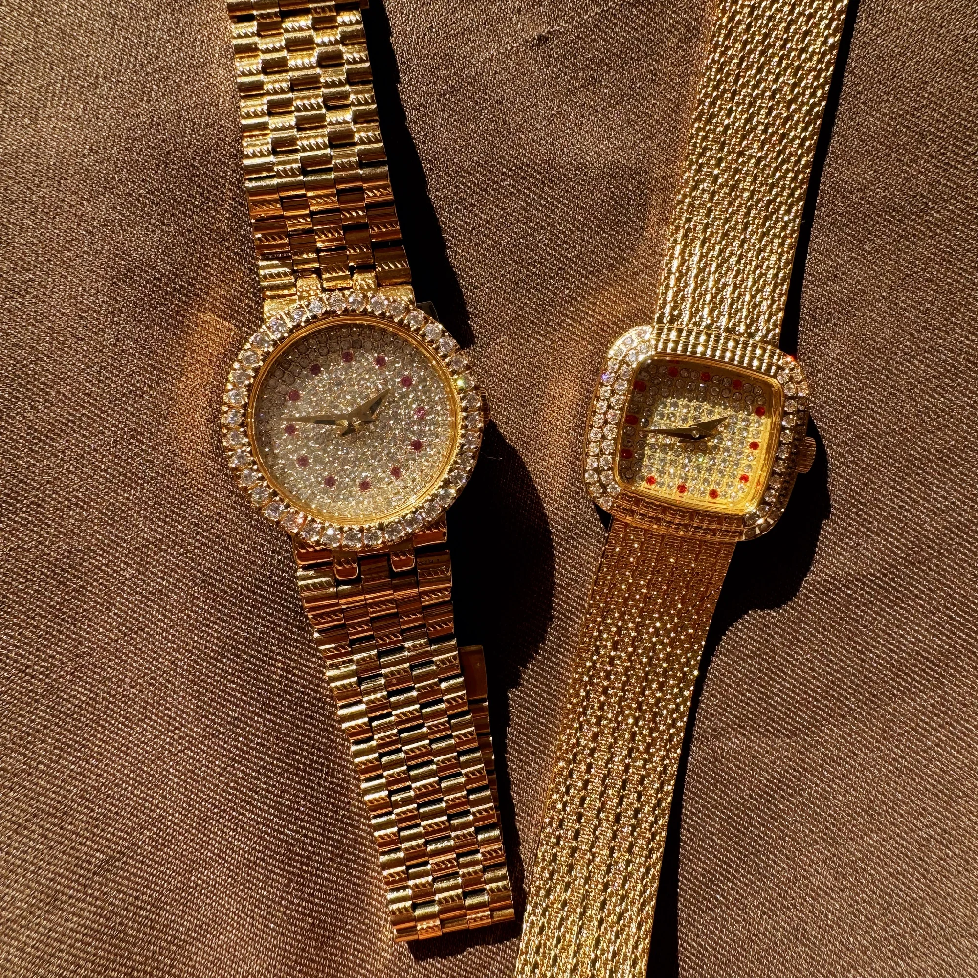 Elegant gold watches adorned with dazzling diamonds, perfect for upscale jewelry lovers.