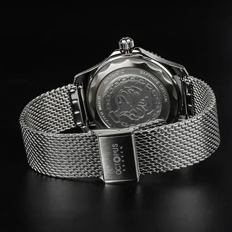 Elegant stainless steel men's watch featuring a sleek mesh band and detailed engraved case back.