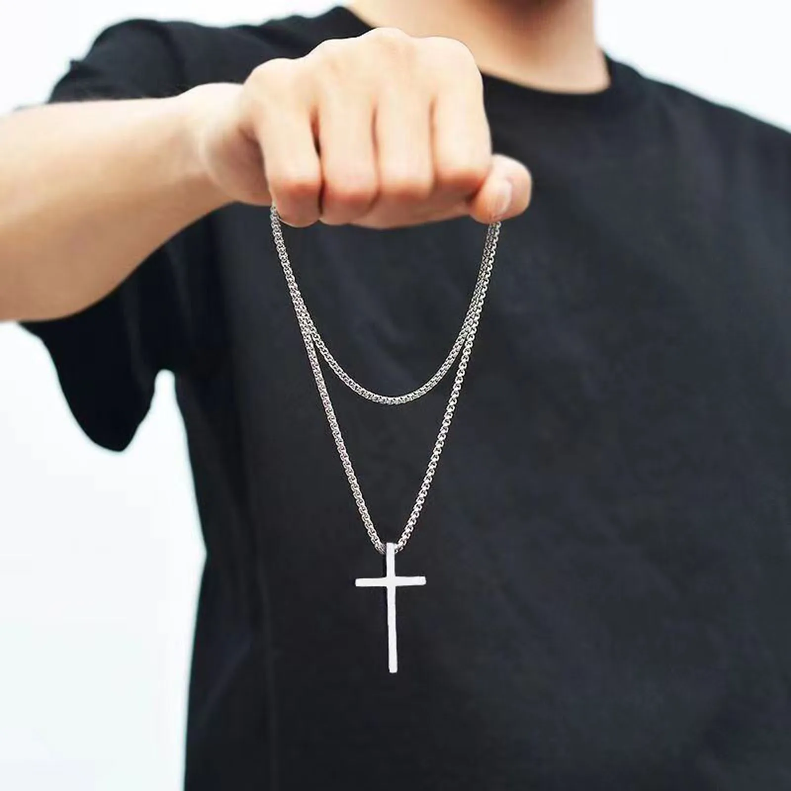 Elegant silver cross pendant necklace, perfect for everyday or special occasions.