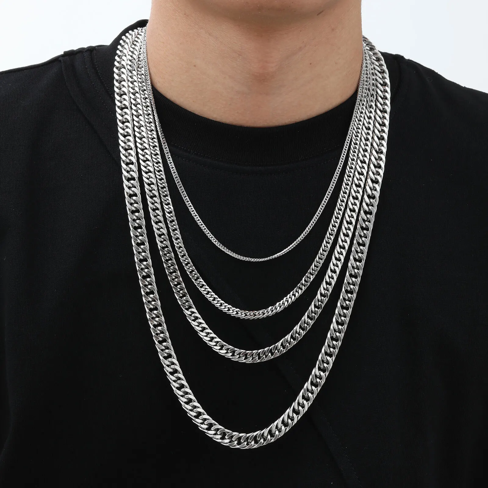 Silver layered chain necklace for men, stylish jewelry accessory for streetwear and casual fashion.