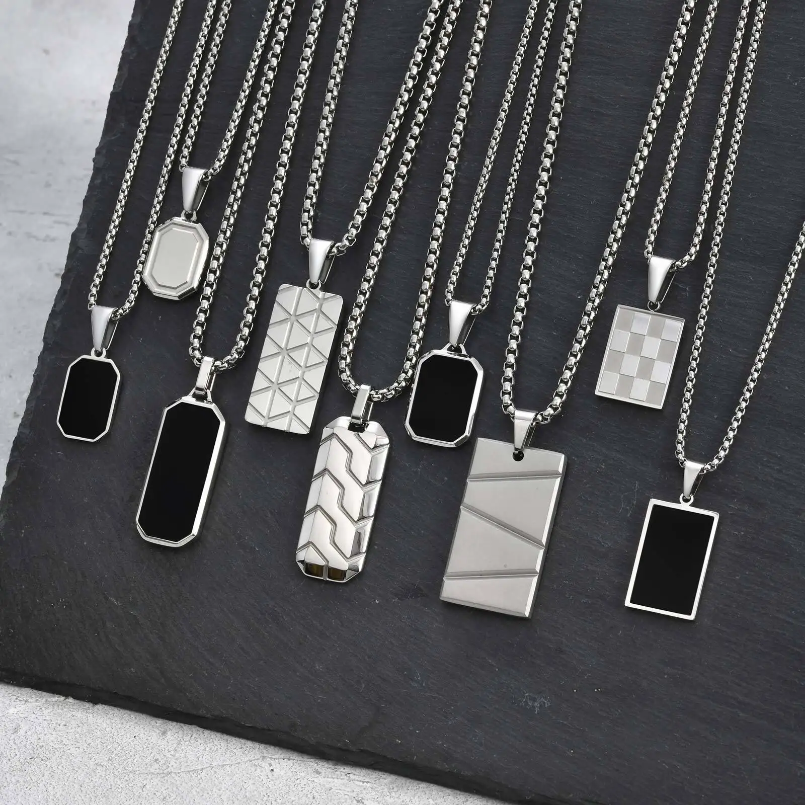 Elegant men's and women's geometric silver pendant chain necklaces. Perfect for everyday or special occasions.