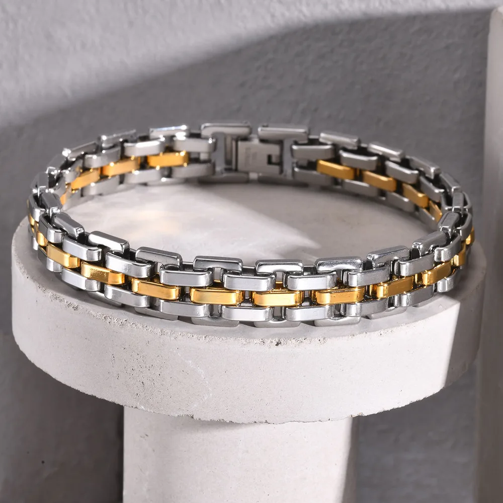 Stylish men's two-tone stainless steel bracelet with silver and gold accents.