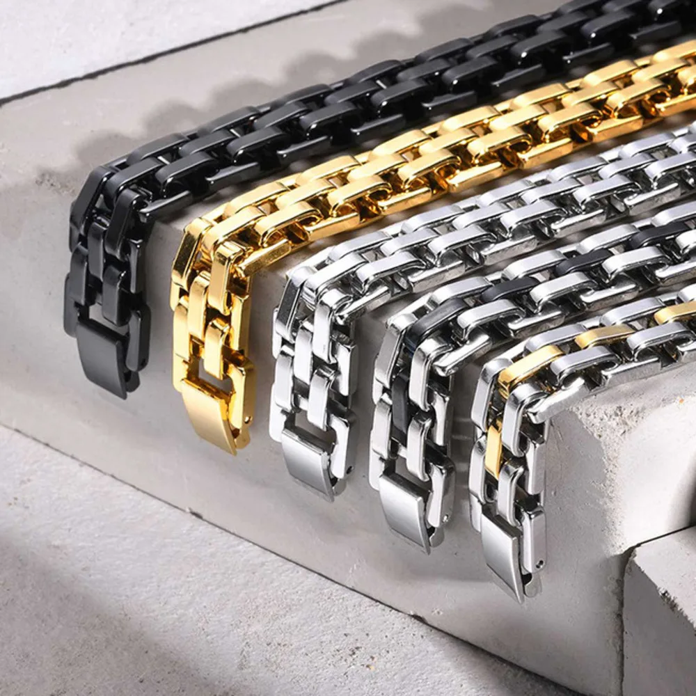 Men's stainless steel chain bracelet with gold, silver, and black finishes for a stylish look.