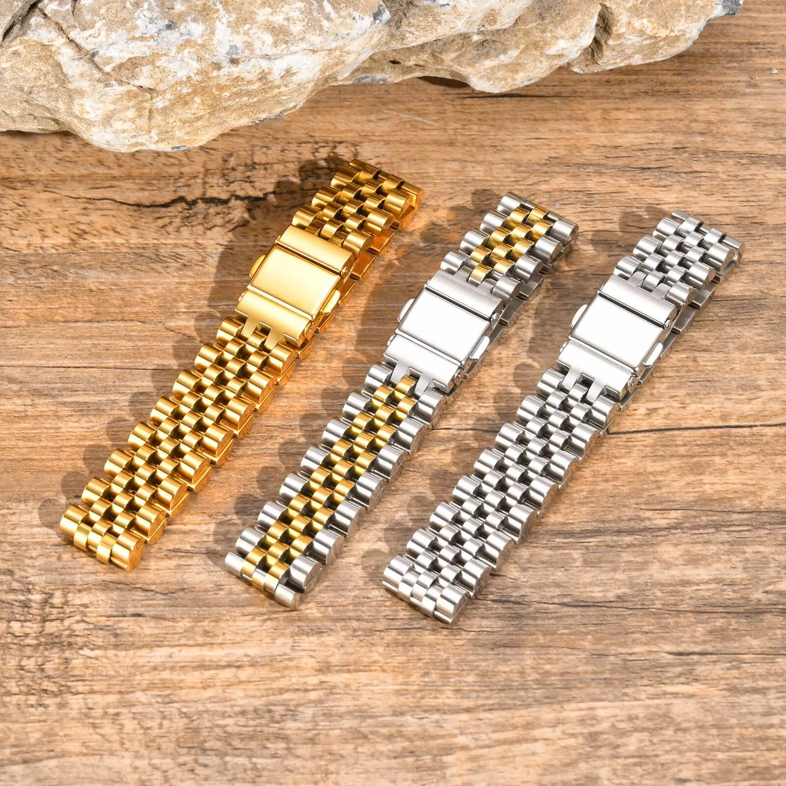 High-quality gold and silver stainless steel watch bands with durable link designs.
