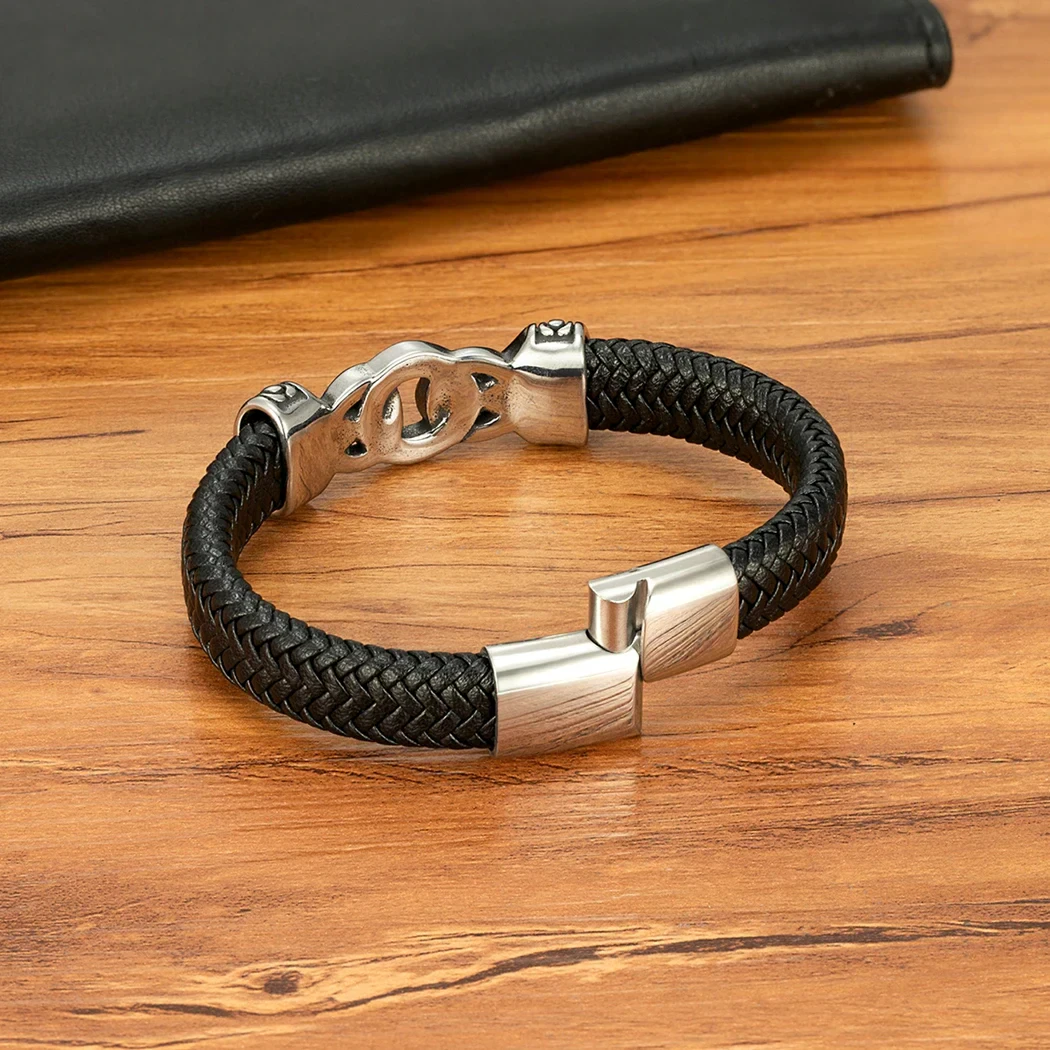 Men's black braided leather bracelet with stainless steel clasp, stylish accessory for everyday wear.