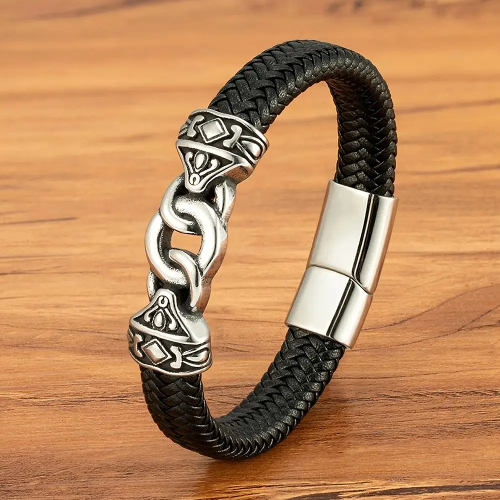 Stylish men's black leather and silver chain bracelet with intricate design. Perfect for everyday wear.