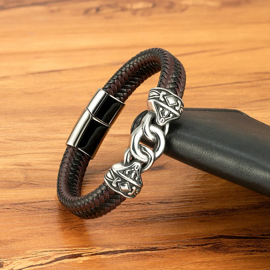 Bracelet featuring leather braid, silver skull details, and magnetic closure, perfect for men's or women's jewelry collection.