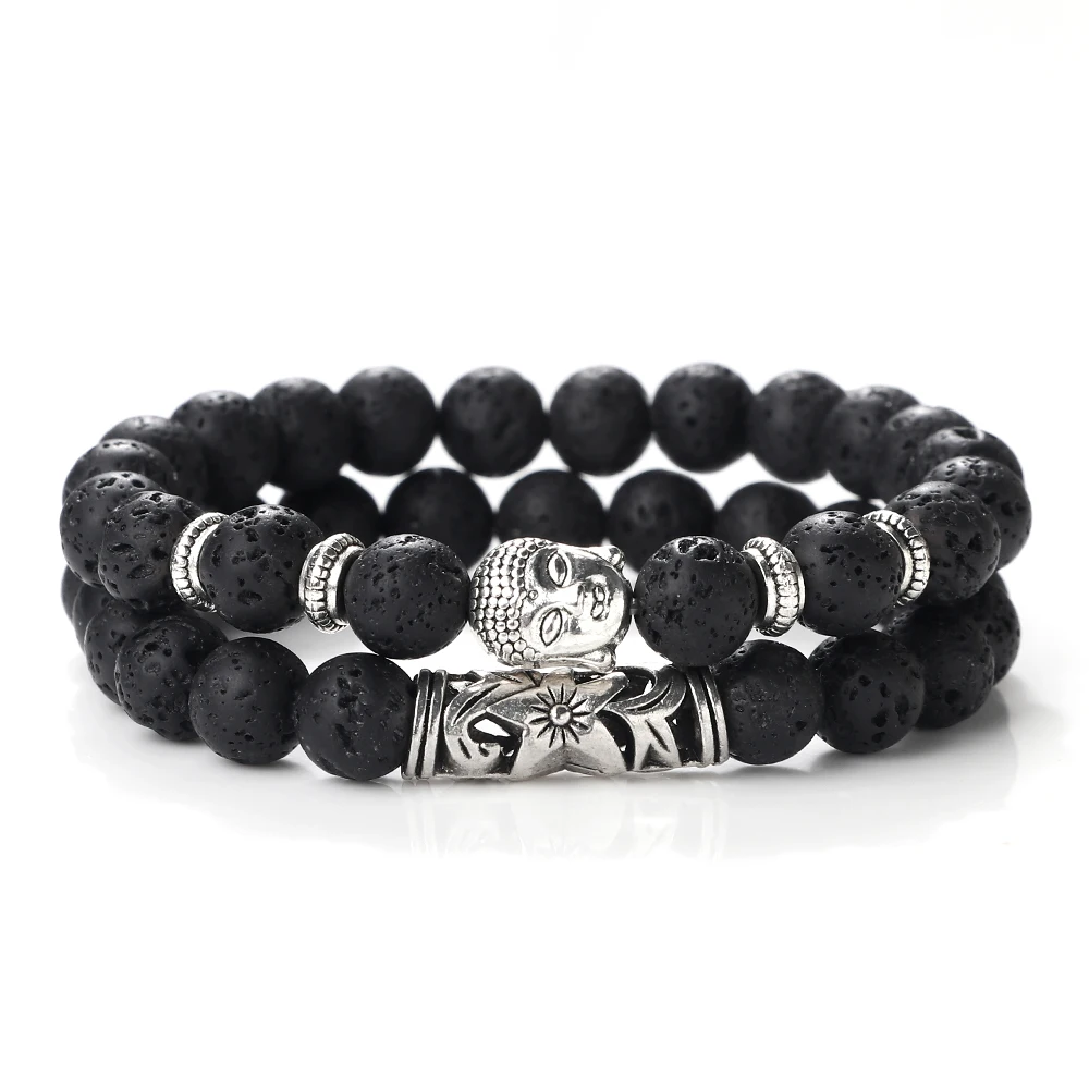 Bracelet with lava stone and tiger eye beads, featuring a skull charm and silver accents.