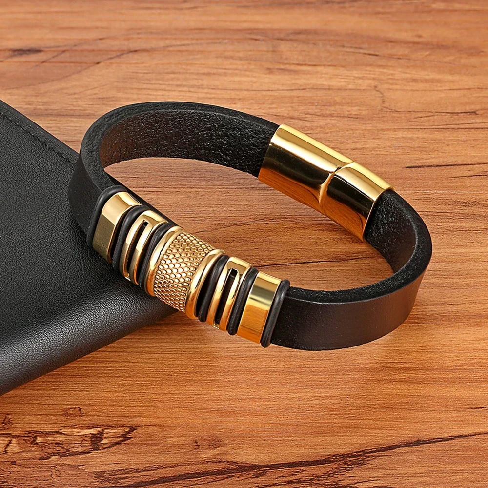 Black leather bracelet with gold accents, trendy jewelry accessory for men and women.