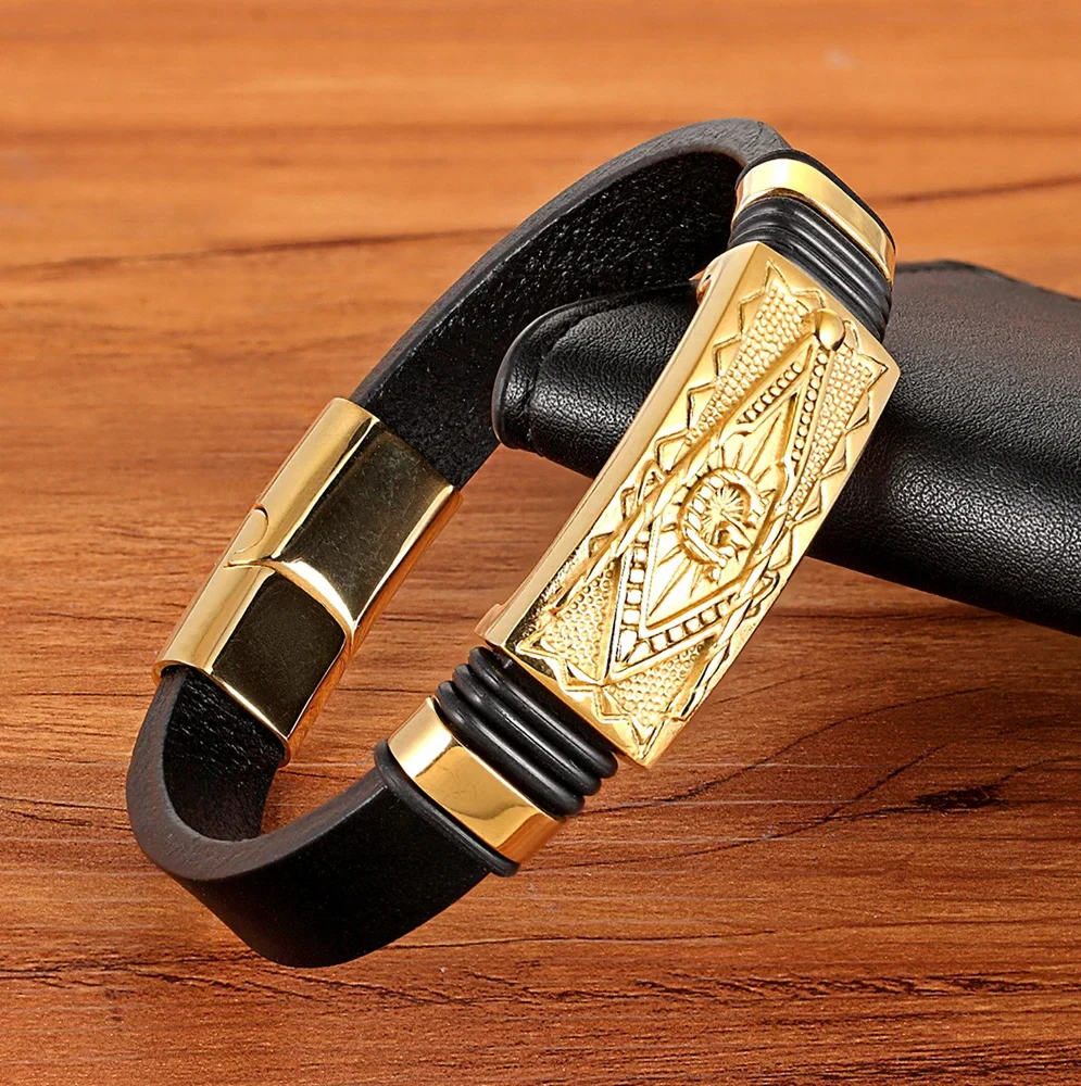 Stylish black leather bracelet with intricate gold accents and a modern clasp, perfect for fashion-forward accessories.